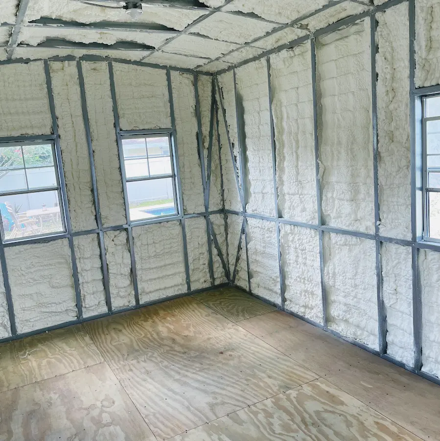 Closed-cell spray foam insulation applied to wall cavities in a residential project in Ontario